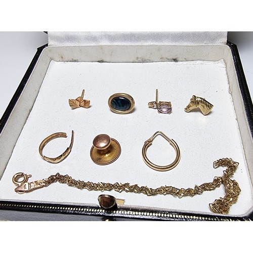 258 - A collection of scrap 9ct yellow gold with a total weight of 3.51g