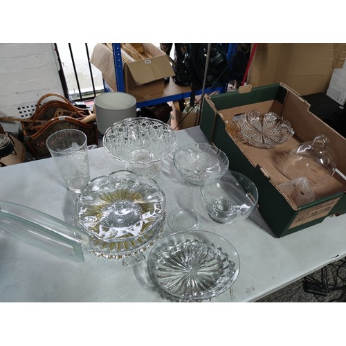 469 - 2x boxes containing a large quantity of glassware inc cake plates fruit bowls, vases and cheese dome... 