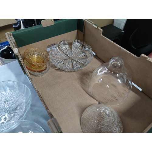 469 - 2x boxes containing a large quantity of glassware inc cake plates fruit bowls, vases and cheese dome... 