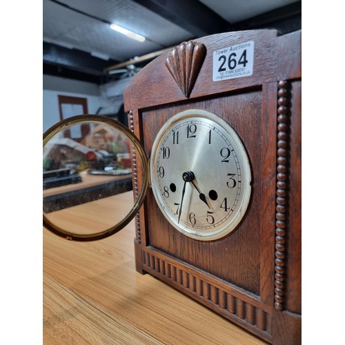 264 - A good quality solid oak cased art deco mantel clock in very clean condition with no nasty marks to ... 