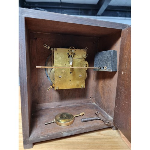 264 - A good quality solid oak cased art deco mantel clock in very clean condition with no nasty marks to ... 