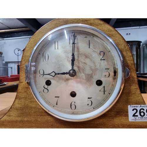 269 - A mahogany Napolian hat mantel clock featuring Westminster chimes, in good condition and complete wi... 