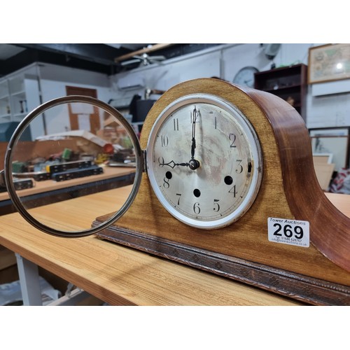 269 - A mahogany Napolian hat mantel clock featuring Westminster chimes, in good condition and complete wi... 