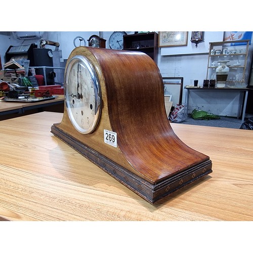 269 - A mahogany Napolian hat mantel clock featuring Westminster chimes, in good condition and complete wi... 