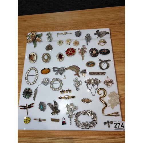 274 - A large collection of approx 50 various brooches, display board is not included, please study photos... 