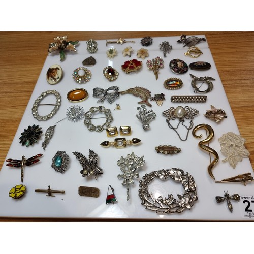 274 - A large collection of approx 50 various brooches, display board is not included, please study photos... 