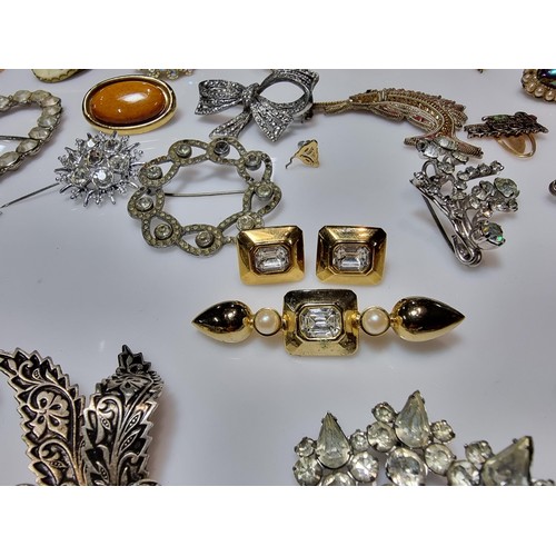 274 - A large collection of approx 50 various brooches, display board is not included, please study photos... 