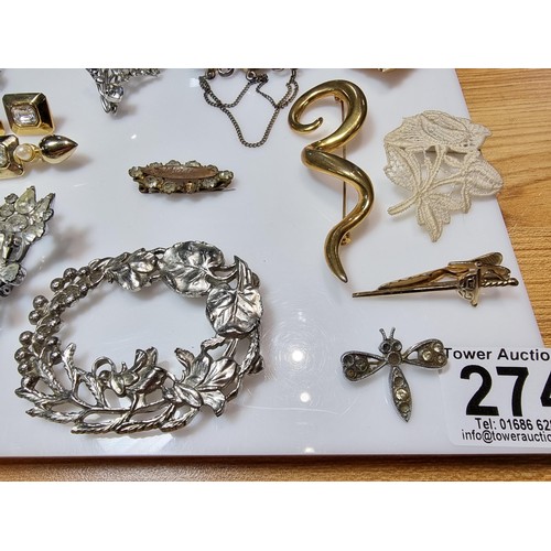 274 - A large collection of approx 50 various brooches, display board is not included, please study photos... 