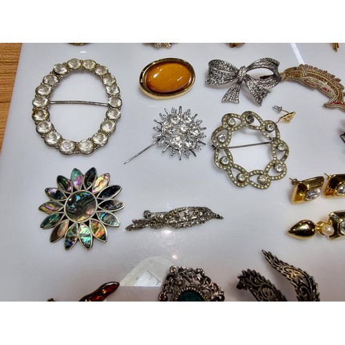 274 - A large collection of approx 50 various brooches, display board is not included, please study photos... 