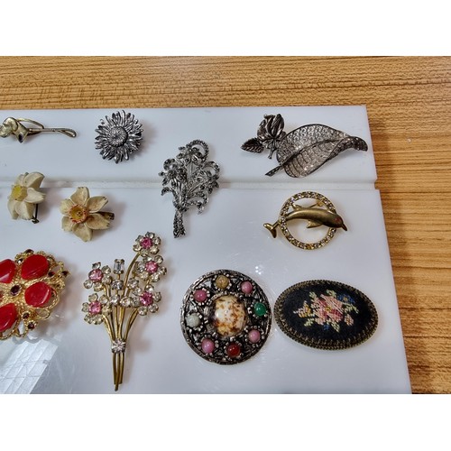 274 - A large collection of approx 50 various brooches, display board is not included, please study photos... 