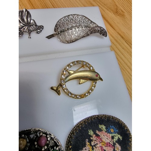 274 - A large collection of approx 50 various brooches, display board is not included, please study photos... 