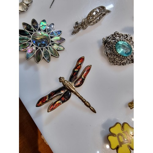 274 - A large collection of approx 50 various brooches, display board is not included, please study photos... 