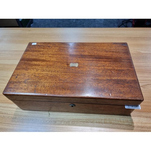 276 - an antique mahogany writing box fitted inside with a writing slope and many different compartments, ... 