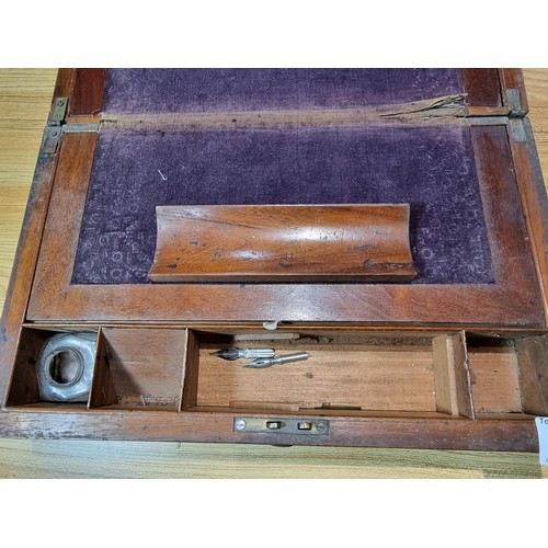 276 - an antique mahogany writing box fitted inside with a writing slope and many different compartments, ... 