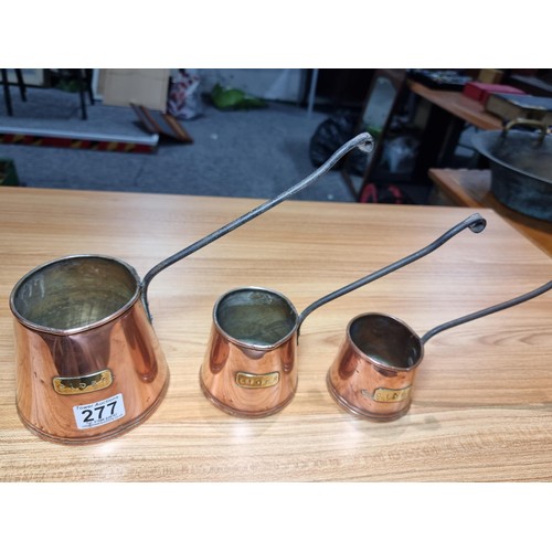 277 - 3 good antique copper graduated cider measures, largest pot has a height of 12cm, diameter 13cm.