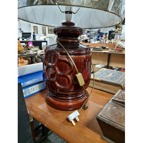 280 - A large West German vintage ceramic lamp base with a treacle glaze having a floral design, complete ... 