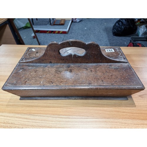 283 - A good solid oak Edwardian 2 compartment carrying box, carved to the top A.D 1913, has a height of 2... 