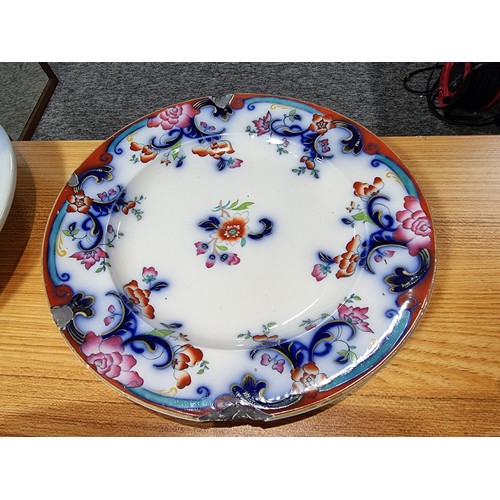 287 - A collection of antique plates to include a good hand painted charger made in Germany, an antique We... 