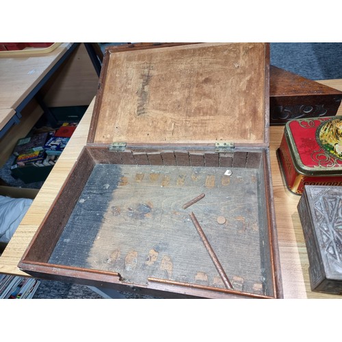 285 - A collection of wooden boxes and vintage tins to include a good antique triangular oak box carved EI... 