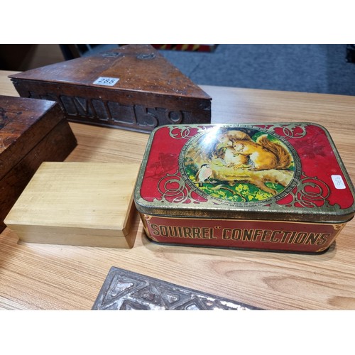 285 - A collection of wooden boxes and vintage tins to include a good antique triangular oak box carved EI... 