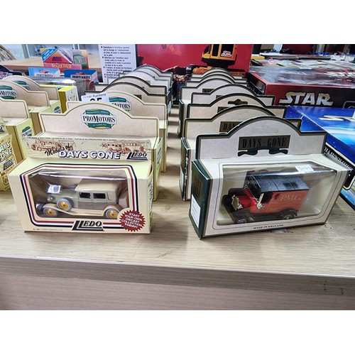 65 - A large collection of 16x diecast model vehicles, all as new by Days gone, Lledo, Promoters, etc.