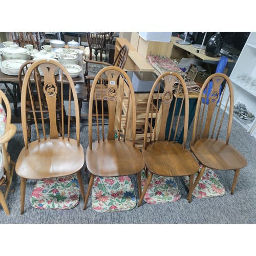 476 - Set of 4 Ercol spindle back dining chairs with carved swan in backs, with floral seat pads all in go... 