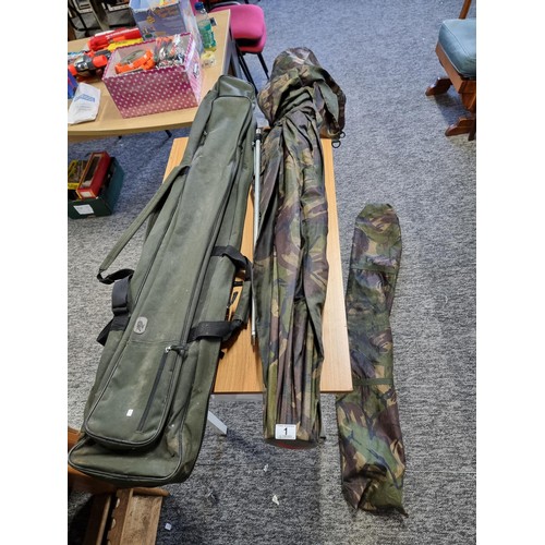 A Crane sports fishing rod bag along with a Discovery CCX Hermit fishing  brolly with its original ca