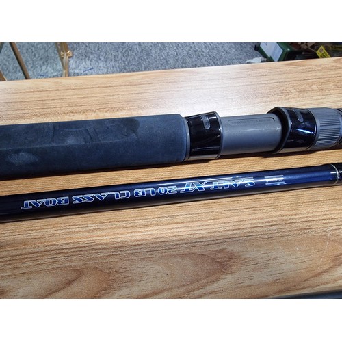 2 - A Vulcan X 12 ft 43/4LB sea fishing rod with a Okuma classic XT fishing reel along with a Salt XT 20... 