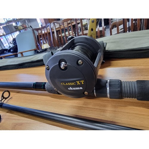 2 - A Vulcan X 12 ft 43/4LB sea fishing rod with a Okuma classic XT fishing reel along with a Salt XT 20... 