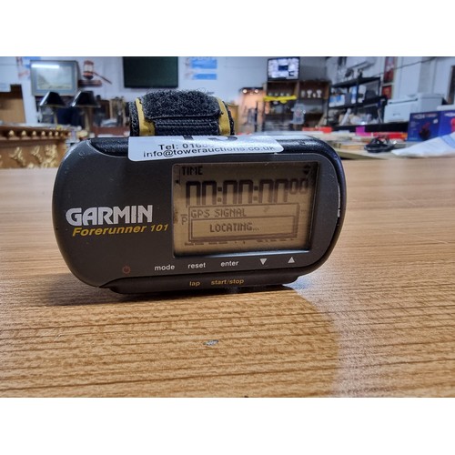 13 - A Garmin forerunner 101 running watch calculates speed, distance, etc. In full working order.