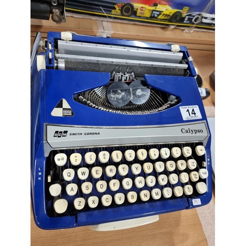 14 - A Smith Corona Calypso cased portable typewriter in good condition, keys appear to not stick.