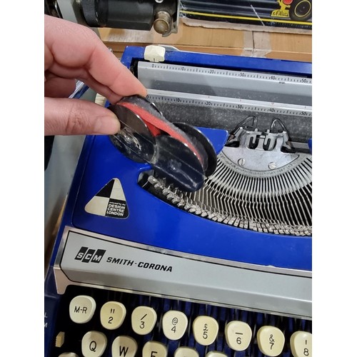 14 - A Smith Corona Calypso cased portable typewriter in good condition, keys appear to not stick.