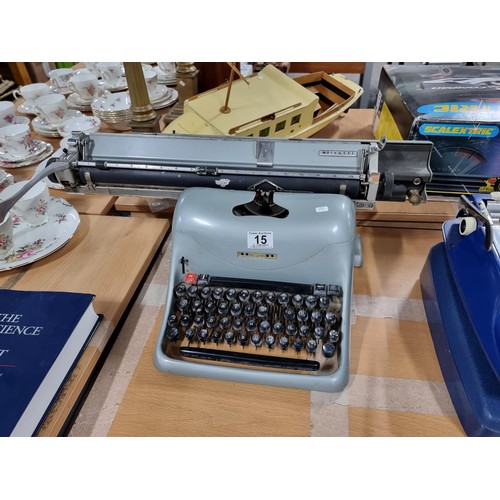 15 - A good vintage Olivetti featuring an A3 size track, in good condition, keys appear to be non sticky ... 