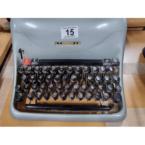 15 - A good vintage Olivetti featuring an A3 size track, in good condition, keys appear to be non sticky ... 