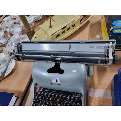 15 - A good vintage Olivetti featuring an A3 size track, in good condition, keys appear to be non sticky ... 