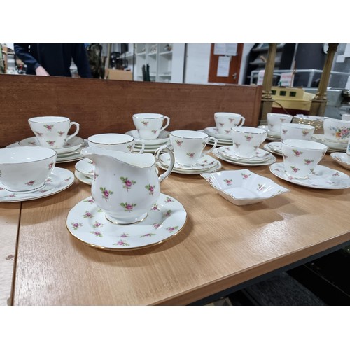 19 - 2x part tea sets to include a pretty tea set by Paragon China with a floral design along with a Pall... 