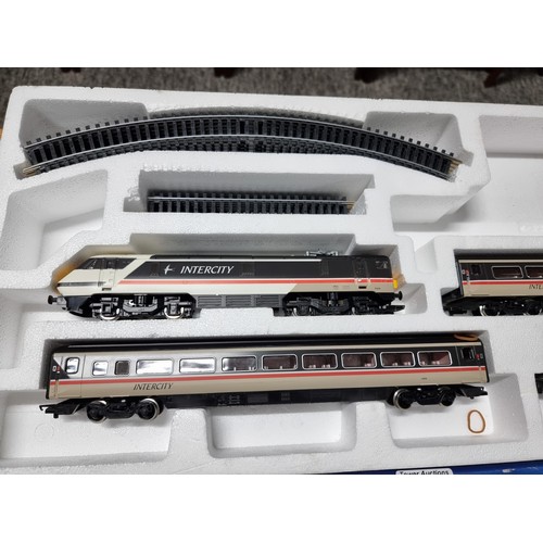 26 - A boxed Hornby R696 intercity 225 4 car diesel train set, complete with all its paperwork, track and... 