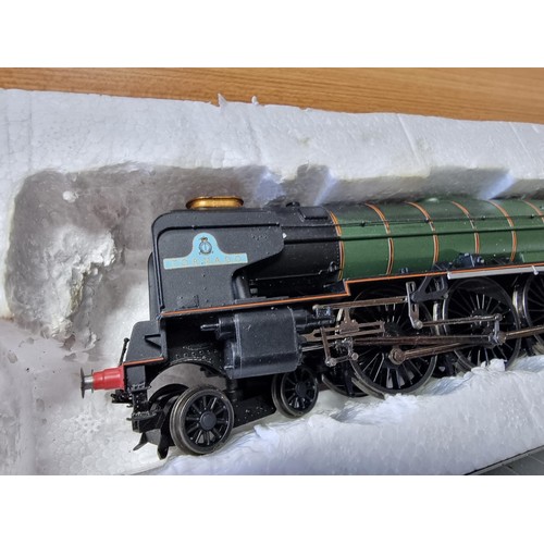 29 - A Hornby 3059 tornado and tender with a 3 pullman coaches 60163 the loco is missing its motor otherw... 