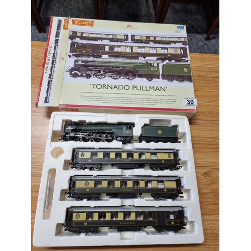 30 - An as new boxed Hornby R3093 tornado pullman track with tornado loco and tender with 3 matching pull... 