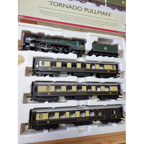 30 - An as new boxed Hornby R3093 tornado pullman track with tornado loco and tender with 3 matching pull... 