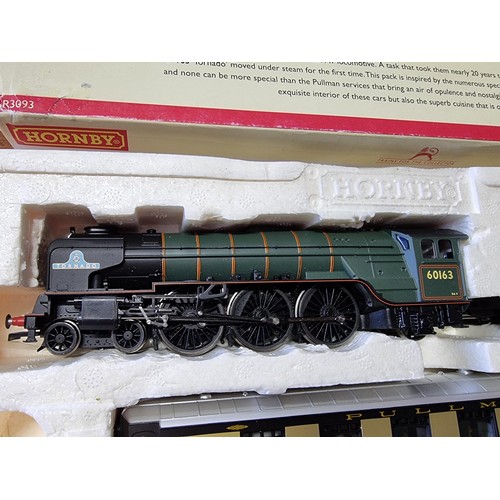 30 - An as new boxed Hornby R3093 tornado pullman track with tornado loco and tender with 3 matching pull... 