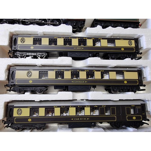 30 - An as new boxed Hornby R3093 tornado pullman track with tornado loco and tender with 3 matching pull... 