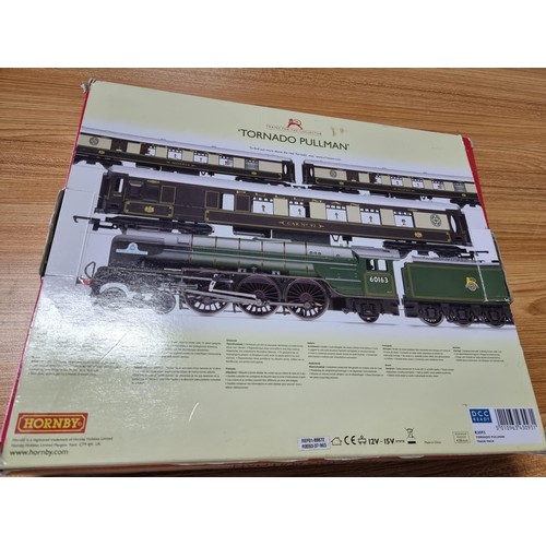 30 - An as new boxed Hornby R3093 tornado pullman track with tornado loco and tender with 3 matching pull... 