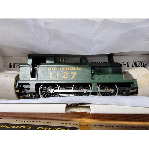 38 - A rare boxed Wrenn W2207 0-6-0 tank southern railways locomotive 1127 in near mint condition, with i... 