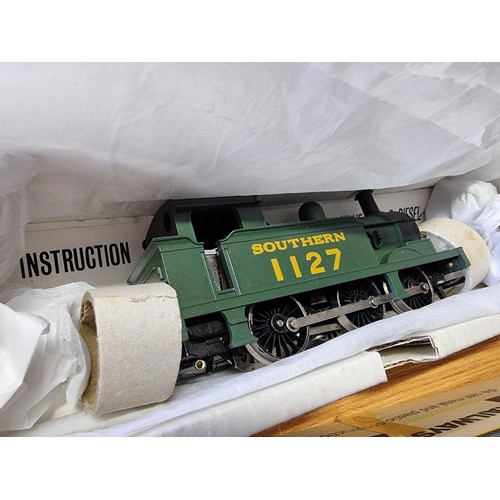 38 - A rare boxed Wrenn W2207 0-6-0 tank southern railways locomotive 1127 in near mint condition, with i... 