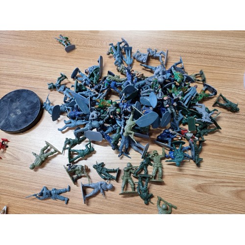 48 - A large collection in 2 tubs of toy soldier figures to include a collection of Britain's Queens guar... 