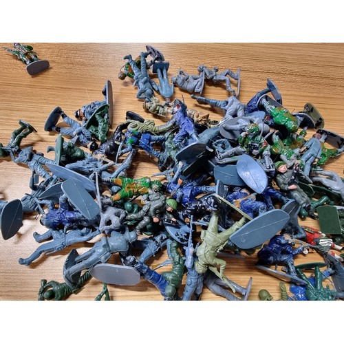 48 - A large collection in 2 tubs of toy soldier figures to include a collection of Britain's Queens guar... 