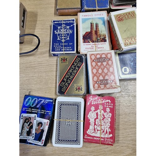 49 - A large collection of various vintage playing card sets to include a good vintage Waddingtons double... 