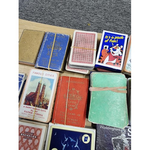 49 - A large collection of various vintage playing card sets to include a good vintage Waddingtons double... 