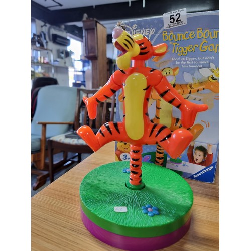 52 - A boxed Disney Bounce Bounce Tigger game along with 4x Nerf guns and a small quantity of foam Nerf b... 